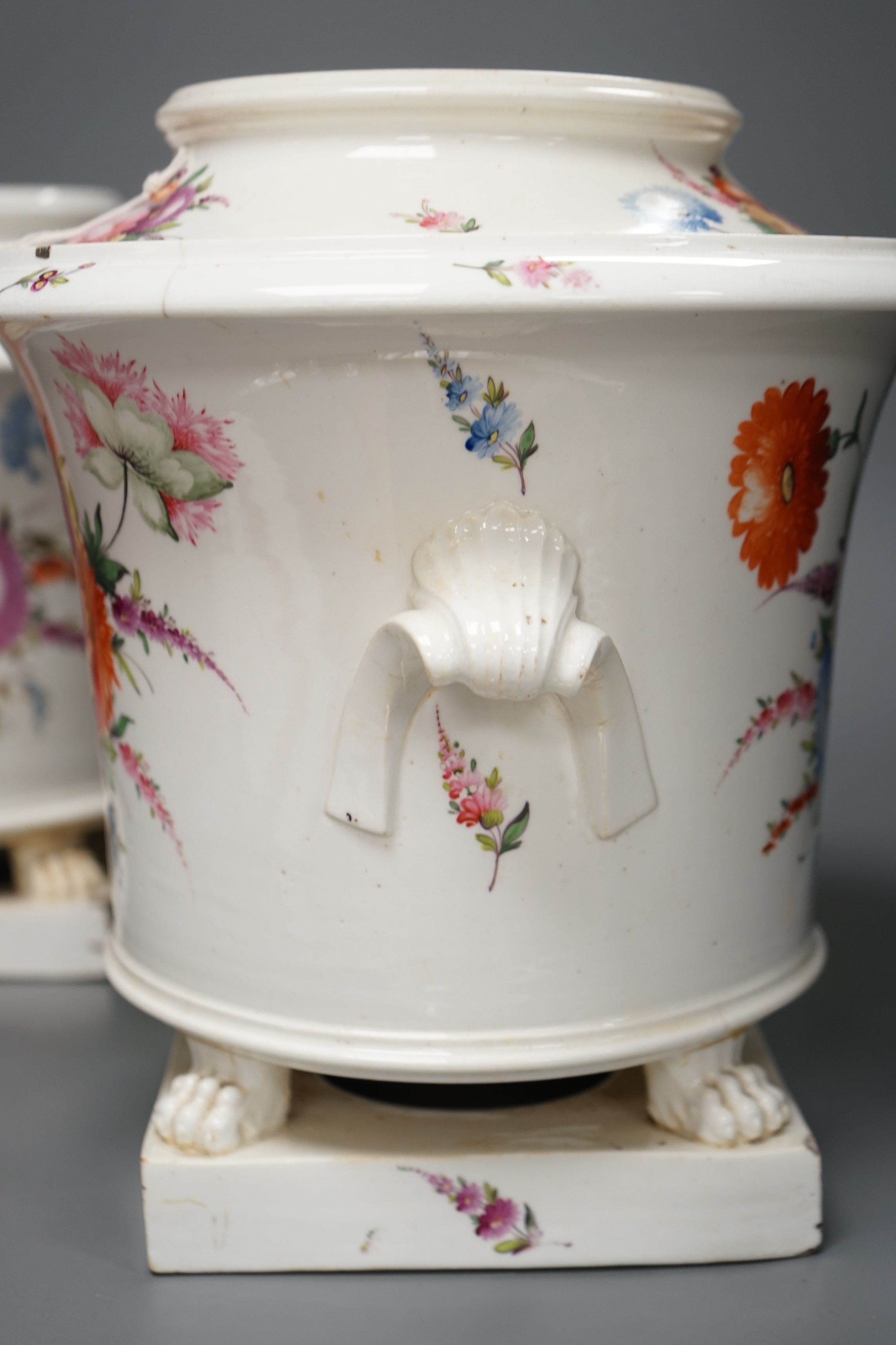 A pair of early 19th century Coalport floral painted ice pails, 29cm